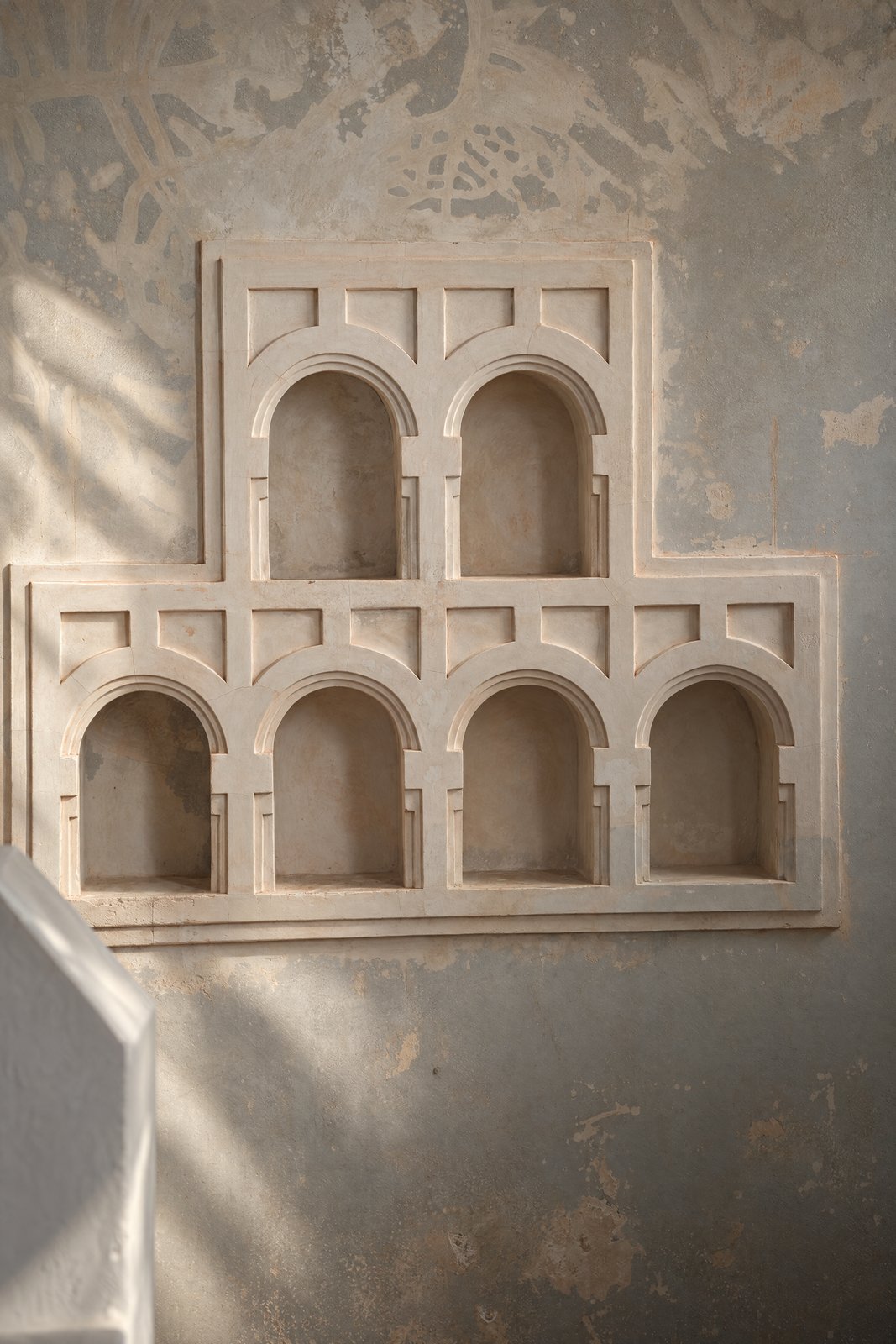Carved plaster niches