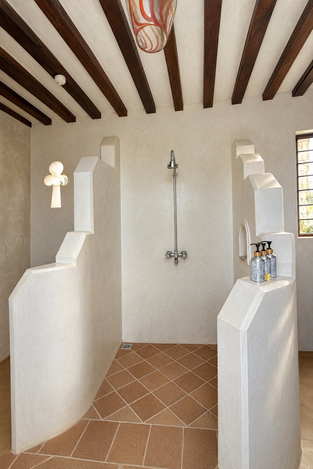 Shower, carved opening and terracotta wet floor
