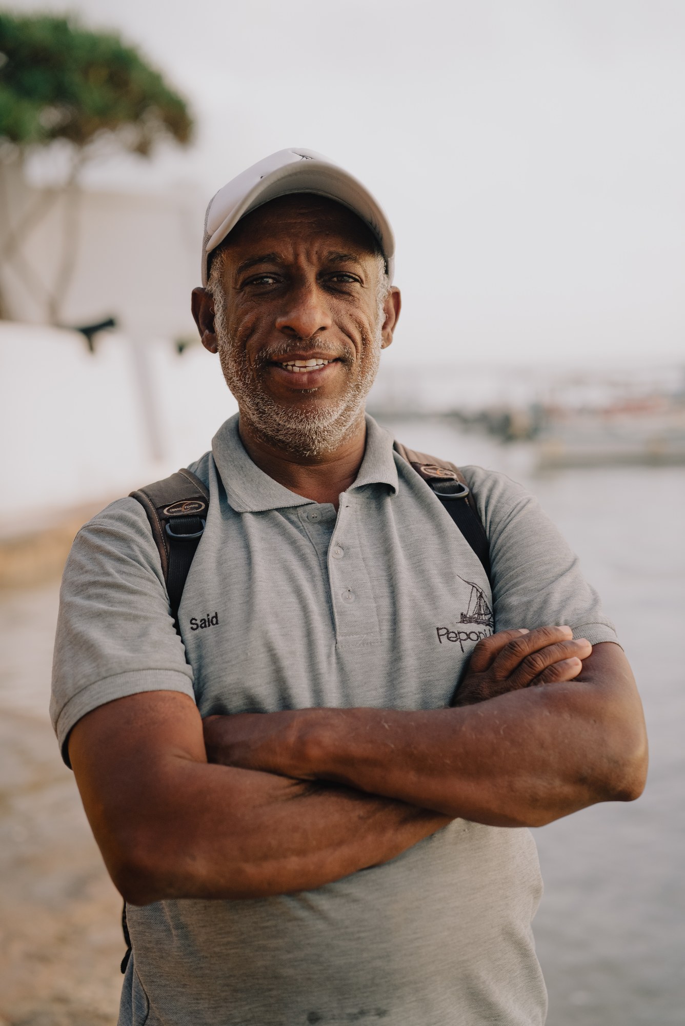 Portrait in a white cap