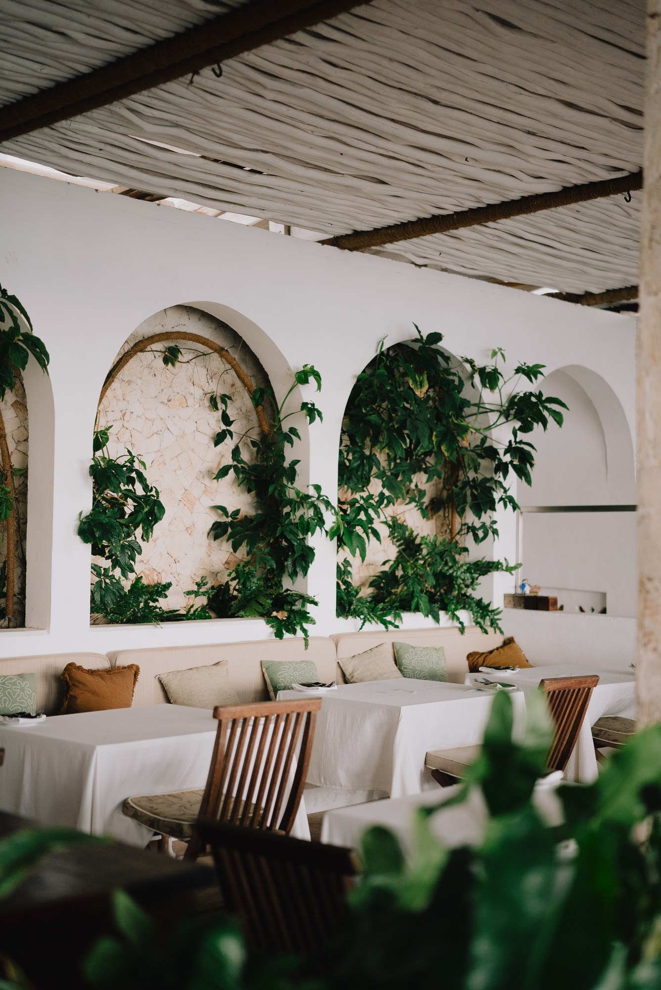 Arched alcoves and planted seating