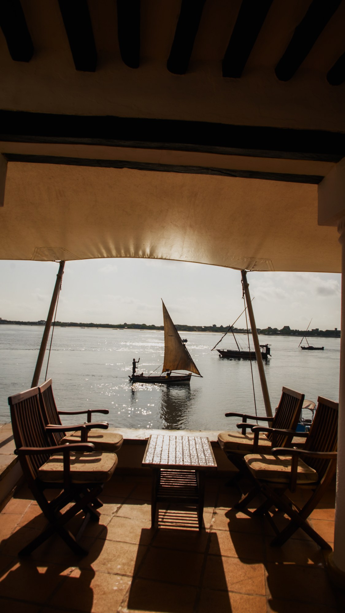 A dhow framed by the veranda